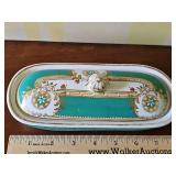 Antique ornate porcelain soap holder.