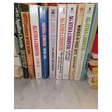 Grouping of 10 Agatha Christie paperback books. See all photos for titles.