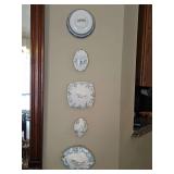 Five antique/vintage blue and white porcelain lids used as decorative wall hangings. 4-7-in diameters.