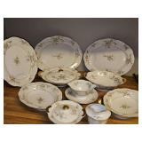 Theodore Haviland Rosalinde China. Serving platters, bowls, creamer l, covered sugar(chipped), gravy boat with attached under plate.