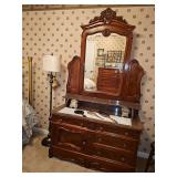 Beautiful antique four-drawer, one door dresser with marble top. 48x21x84 in tall including mirror. Contents NOT included.