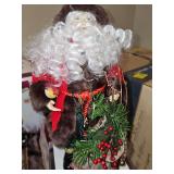 Santa with fur look trim on his coat. 13 in tall.