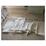 Grouping of (7) various size white linen tablecloths….there is staining on some