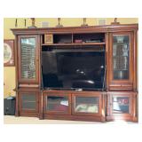 Exquisite Bassett Furniture 3-piece cherry entertainment unit…..each side piece is a separate piece and measures 26-1/2 x 20 x 81 tall…..center unit measures 59-1/4 x 23-1/2 x 81 tall…..located 
