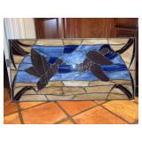 Stained glass panel depicting ducks in flight design…..47-3/4 x 23-3/4
