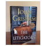 Signed first edition John Grisham novel titled “The Litigators”