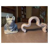 (2) cast iron bookends - left is German Shepherd and measures 3-3/8”w x 4-1/4” tall - right is a railroad track anchor, also known as an anti-creeper and measures 7-1/4” long x 4-1/4” tall