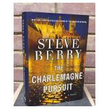 Signed first edition hardback copies of “The Charlemagne Pursuit” by Steve Berry…..includes dust jacket and promo photo