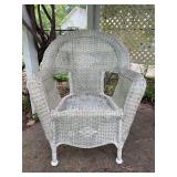 White wicker arm chair - needs cleaned from sitting outside but is a sturdy chair - 27-1/2 x 17-1/2 x 16 tall to seat (35” tall overall)