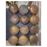 Grouping of 12 brass and cropper decorative doorknobs
