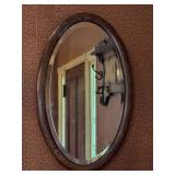 Nice looking oval beveled mirror in oak frame…..16-1/2 x 26-1/2
