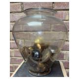 Clear glass urn-style vase and contents of various size brass doorknobs…..all are in used condition….some bent, some badly discolored