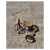 Antique tricycle…..needs cleaned and new front tire and pedals