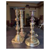 (4) various height brass candlesticks - from 6” to 10”