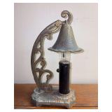 Antique cast iron candle stick lamp, often referred to as a "witch