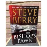 Signed first edition hardback copy of “The Bishop’s Pawn” by Steve Berry…..includes dust jacket and signed promo poster