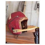 Vintage MacGrwgor red leather football helmet with tan accents - has single bar face protector and inside suspension system