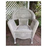 White wicker arm chair - needs cleaned from sitting outside but is a sturdy chair - 27-1/2 x 17-1/2 x 16 tall to seat (35” tall overall)