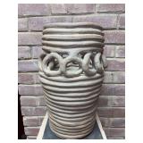 Concrete decorative vase featuring a coil construction technique…..7-1/2”D x 15-1/4” tall