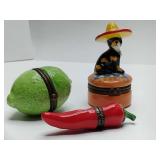 Porcelain hinged trinket boxes designed to look like a lime, a chili pepper, and a dog wearing a sombrero. The dog has a chip, see pic