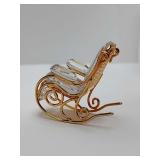 Swarovski Crystal Memories collection, specifically featuring a retired rocking chair.