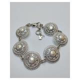 Lucky Brand Silver-Tone Imitation Pearl Disc Link Bracelet. Circular, silver-tone filigree medallions, each set with a faux or imitation pearl in the center