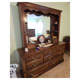 8 drawer dresser with two drawer display hutch. 65.5 x17.5x 75.5 in tall including hutch. Hutch can be removed for two-piece easy transport. Contents NOT included.