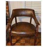 Leather look side chair with nail head trim. 24x20x29.5 in tall. Seat height 18 in.