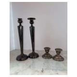 Grouping of weighted sterling candlesticks - 10 & 2-1/2” tall - 1 is missing drip cup and blemishes on smaller ones - smaller are by Crown - 984.4 total grams