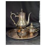 Wm. Rogers 4-piece silverplate tea set - includes tray, teapot, creamer and sugar bowl - creamer has a hairline crack