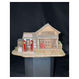 NIB LilliPut Lane American Landmarks “16.9 cents per Gallon” by artist Ray Day - 3” tall