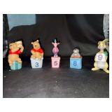 (5) NIB Pooh & Friends Birthday porcelain figurines - for ages newborn, three, five, eight & nine - all in original boxes
