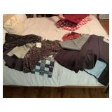 Grouping of skirts and a suit fitting size small