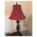 Table lamp 7” x 31” with a burgundy shade