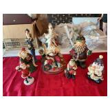 Group of resin Santas