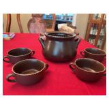 ￼ Brown and tan pot with four bowls. Large bowl is missing lid