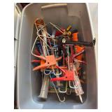 Tote of caulk guns, and a couple banded saws