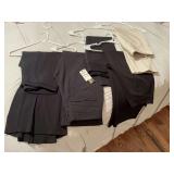 A group of pants size 0-2