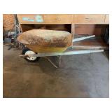 Wooden handled wheelbarrow. bucket is 26” x 37 1/2”