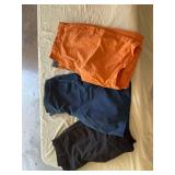 Size 10, 14  and 14 husky shorts from left to right