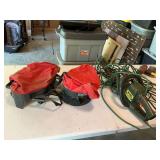 Two seeders with a Black & Decker 16 inch electric hedge trimmer and extension cord