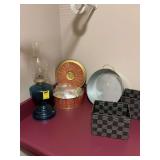 Vintage tin with sewing notions, a blue based oil lamp and a couple of other pieces