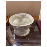 Five and three-quarter inch cream and Brown pottery bowl