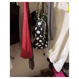 Grouping of purses with jackets and miscellaneous tops