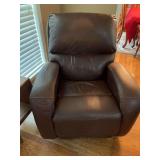 Brown leather rocker recliner slight rubbing in head area 32” x 34” x 40”