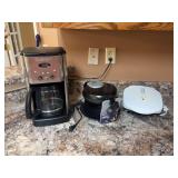 Cuisinart coffee maker, Lean Mean grilling machine and an Oster Belgium waffle maker ￼