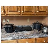 Crockpot, a Presto grid iron and fry daddy and a fry daddy brand fry daddy ￼￼