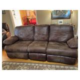 Brown leather double reclining sofa 88” x 38“ x 39 inches The right side no longer reclines