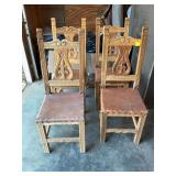 Four Spanish carved chairs 16” x 18” x 42” with the seat height being 18 inches