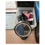 Group of bathroom hair and makeup supplies